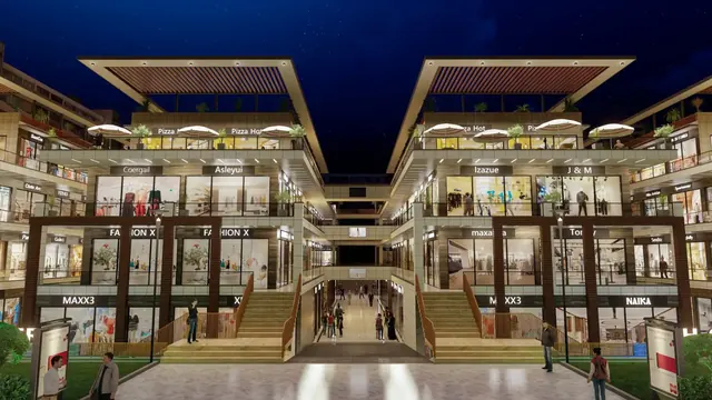 Artistic impression: central atrium and staircase at night